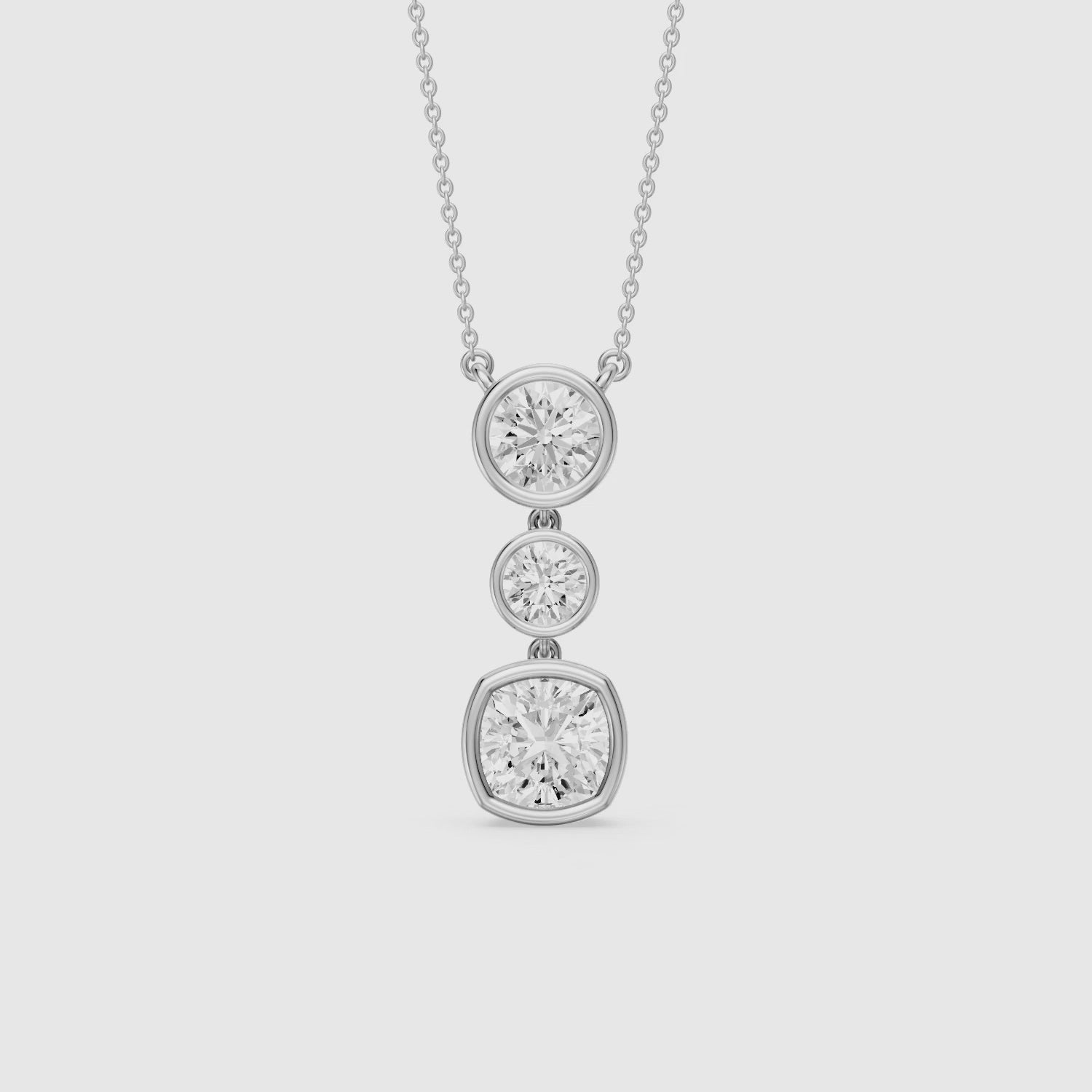Load video: Amari Three Stone Cushion Cut and Round Cut Lab Grown Diamond Pendant