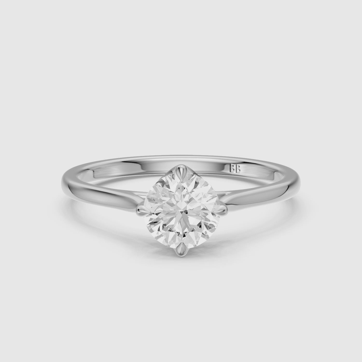 Load video: Brynna 4 Prong Round Cut Solitaire Moissanite Diamond Ring