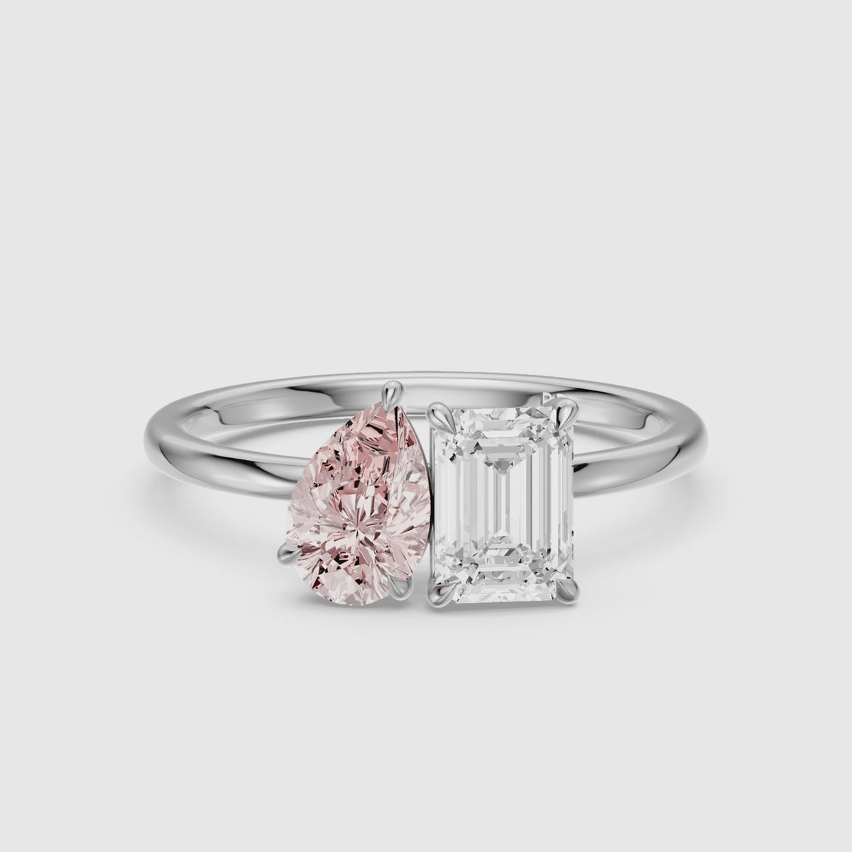 Load video: Milena Pink Pear and Emerald Cut Color Lab Grown Diamond Toi et Moi Ring