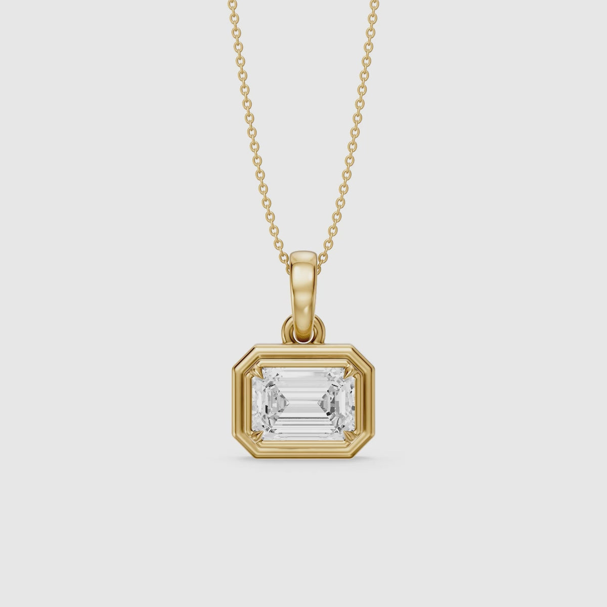 Load video: Leighton Emerald Cut Lab Grown Diamond East West Bezel Pendant