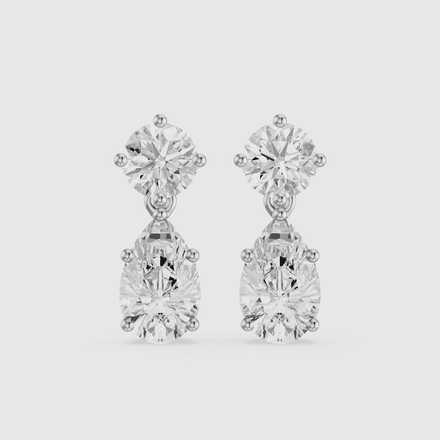 Load video: Edith Round and Pear Shape Lab grown Diamond Drop Earrings