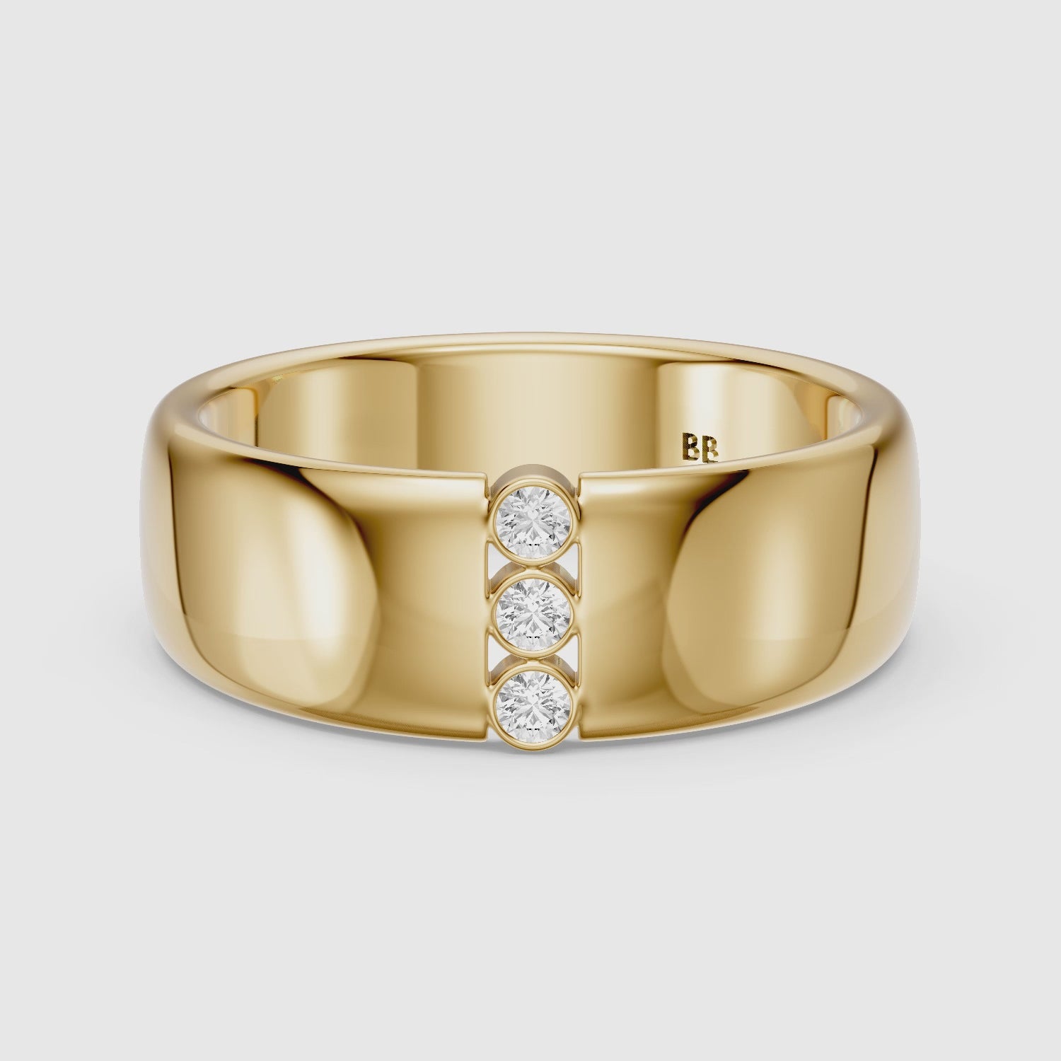 Load video: Chiara Round Cut Lab Diamond Bezel Set Three Stone Cigar Band