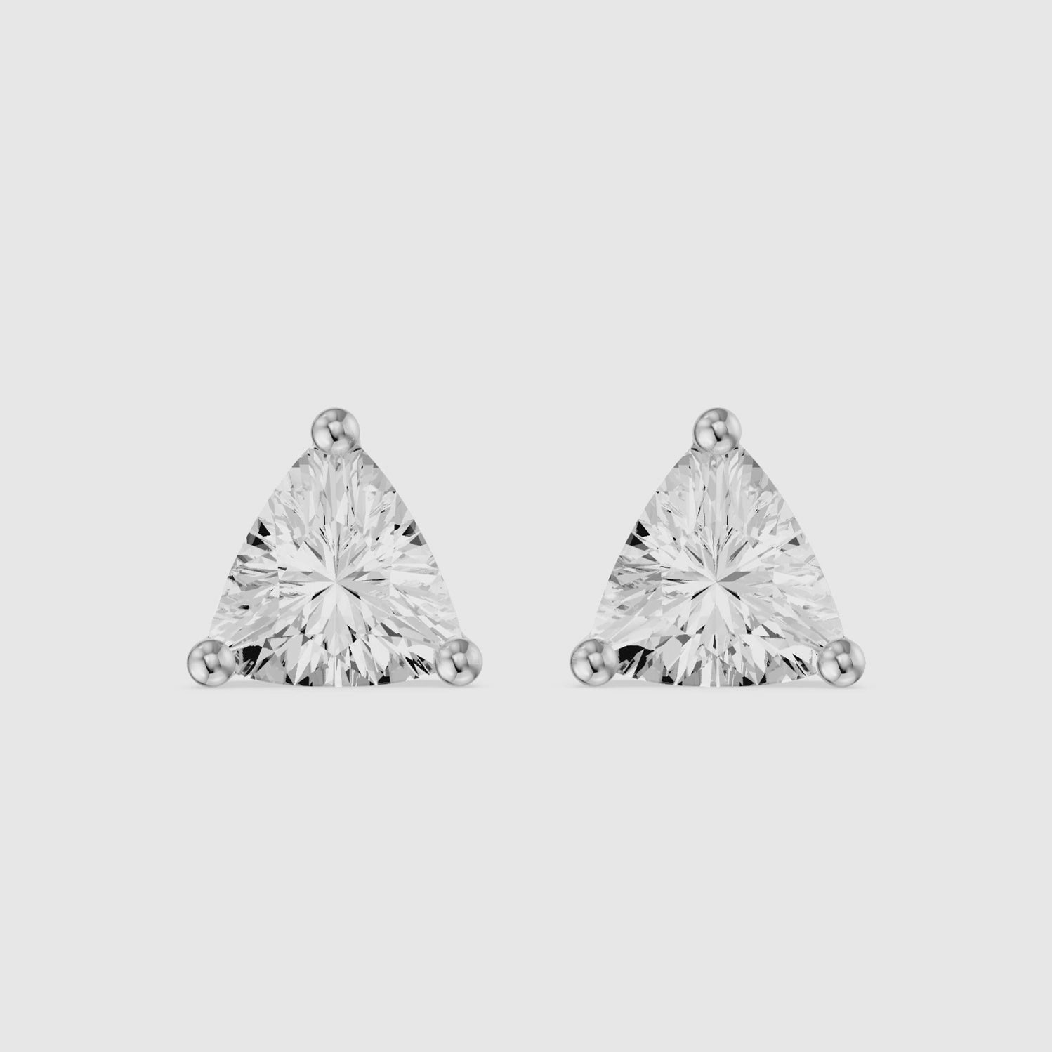 Load video: Delara Trillion Cut Blue Opal Solitaire Three Prong Basket Stud Earrings