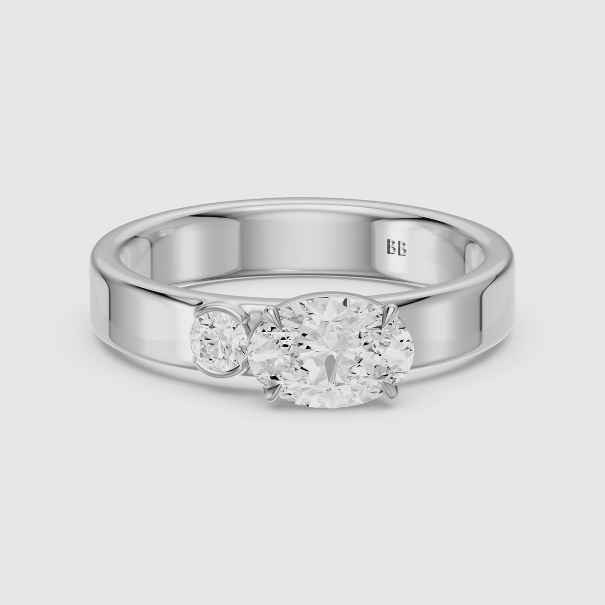 Load video: Tansy Oval Cut Round Side Stone Moissanite Diamond Engagement Ring