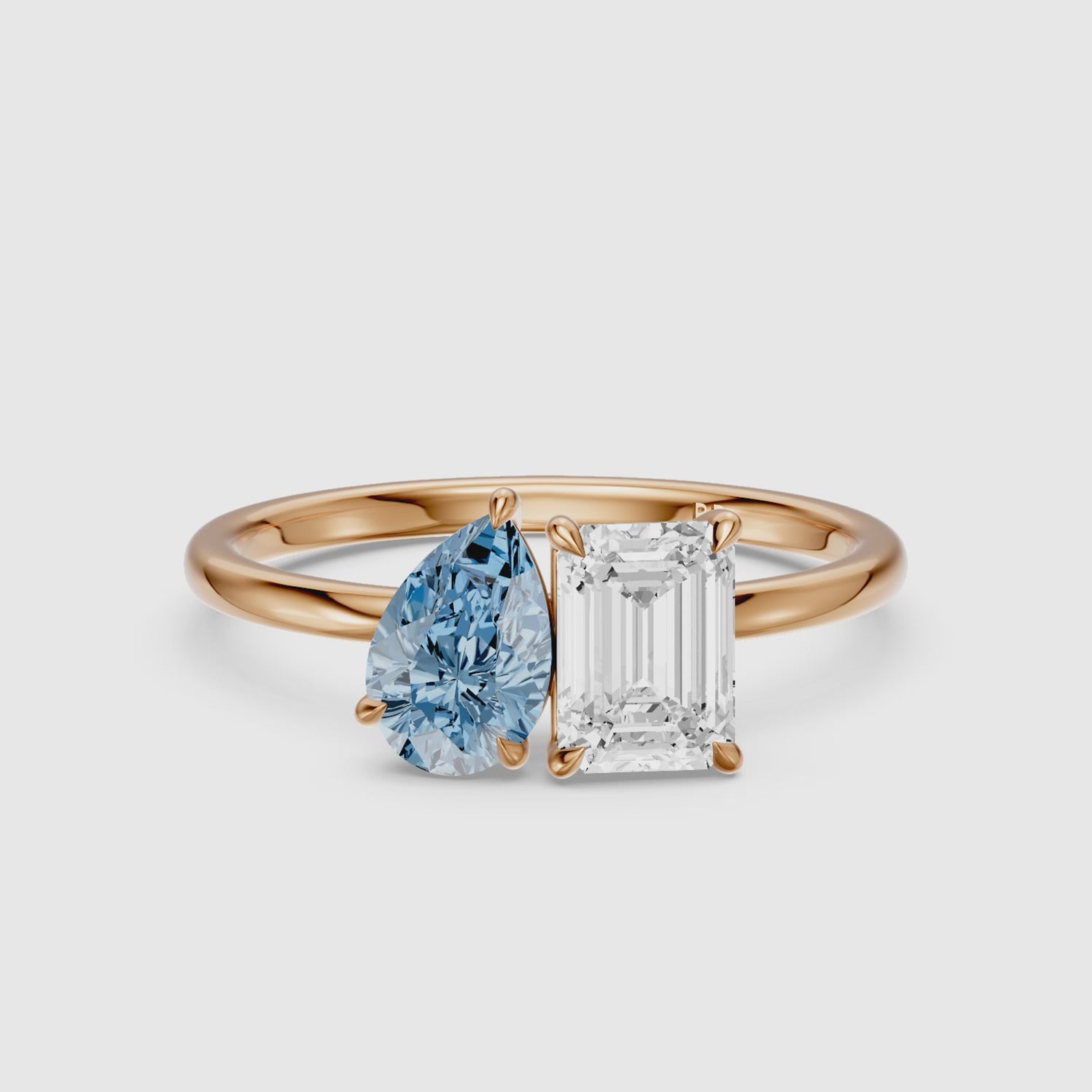 Load video: Eliska Blue Pear and Emerald Cut Color Lab Grown Diamond Toi et Moi Ring
