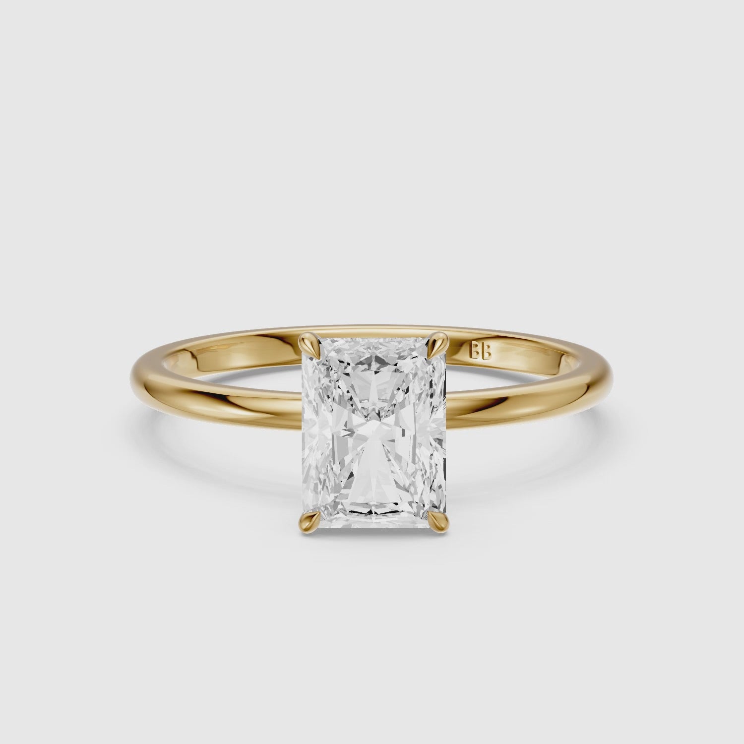 Load video: Clarie 4 Prong Radiant Cut Solitaire Moissanite Diamond Ring