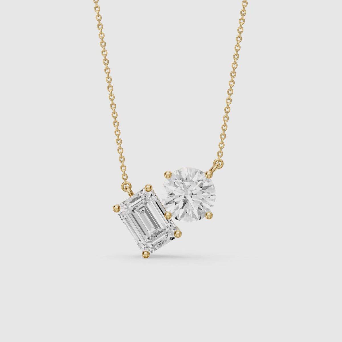 Load video: Navy Emerald and Round Lab Grown Diamond Toi Et Moi Pendant