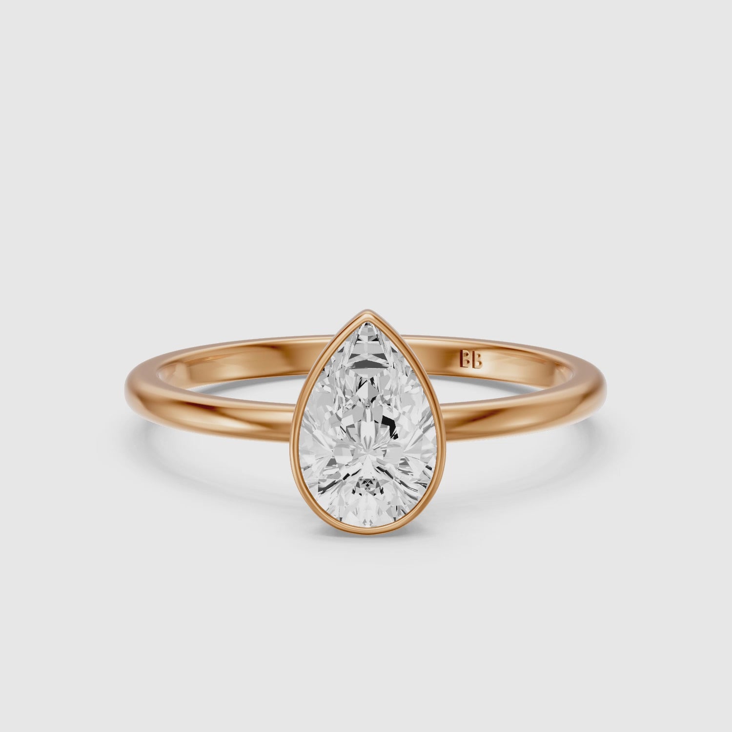 Load video: Kassia Pear Cut Bezel Set Solitaire Lab Grown Diamond Ring