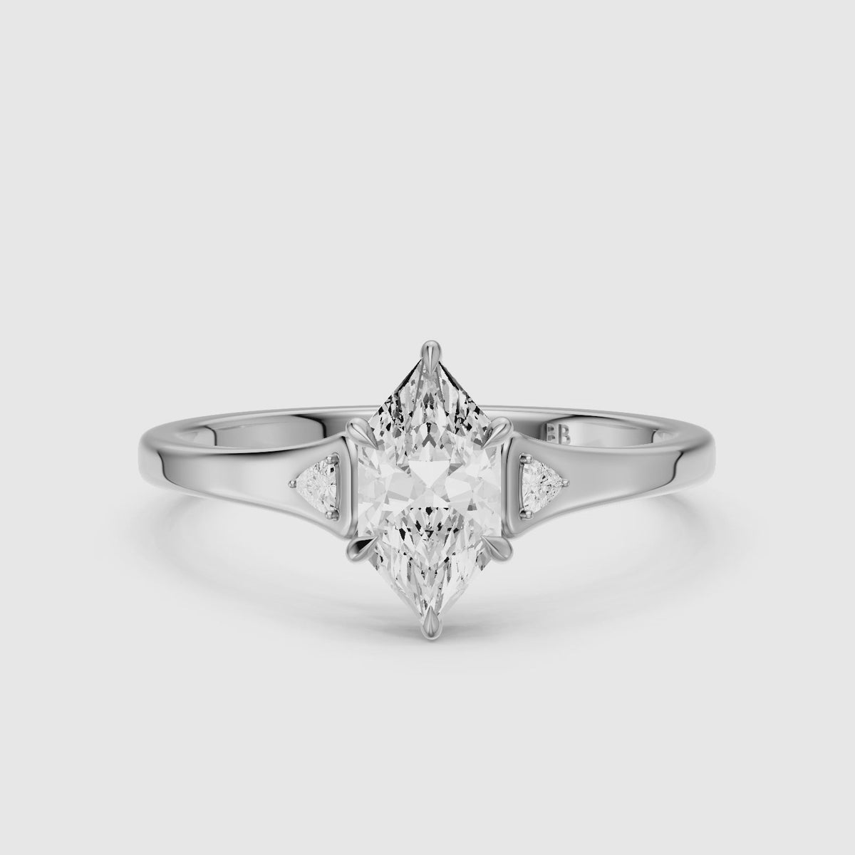 Load video: Zelia Dutch Marquise Moissanite Diamond Ring with Trillion Side Stones