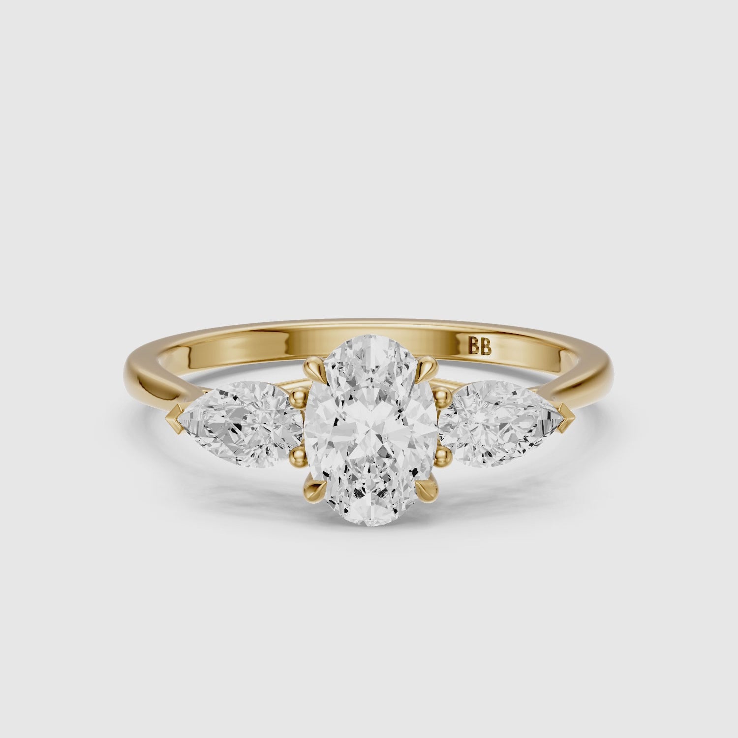 Load video: Ashlyn Three Stone Oval With Pear Side Stone Lab Grown Diamond Ring