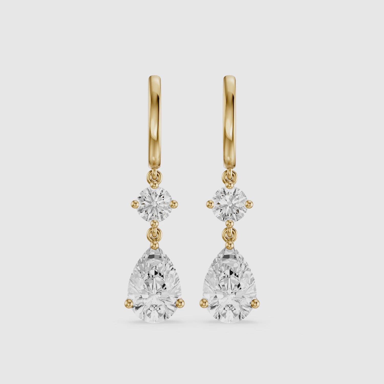 Load video: Aliza Round and Pear Lab Grown Diamond Huggie Drop Earrings