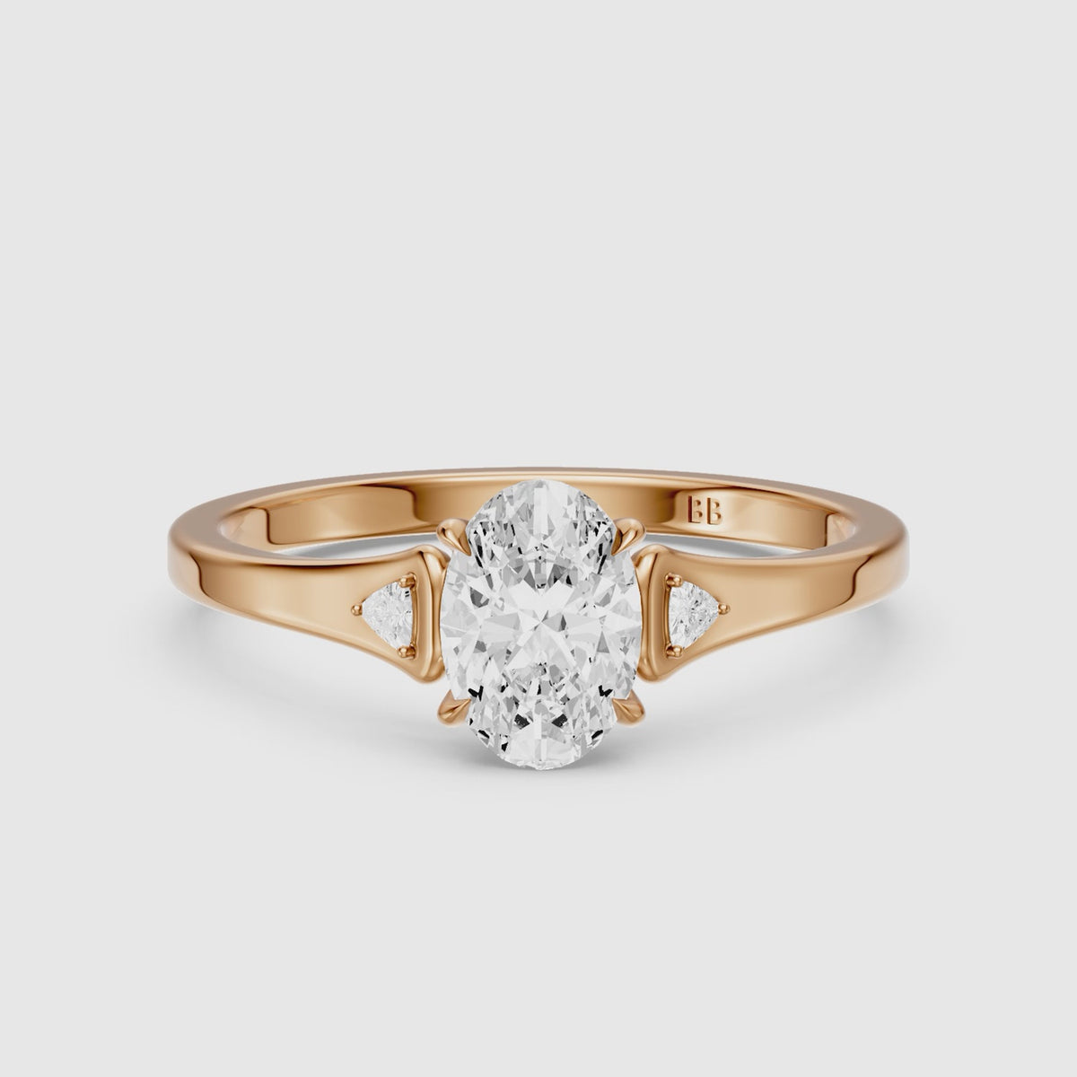Load video: Maelle Oval Lab Grown Diamond Ring with Trillion Side Stones